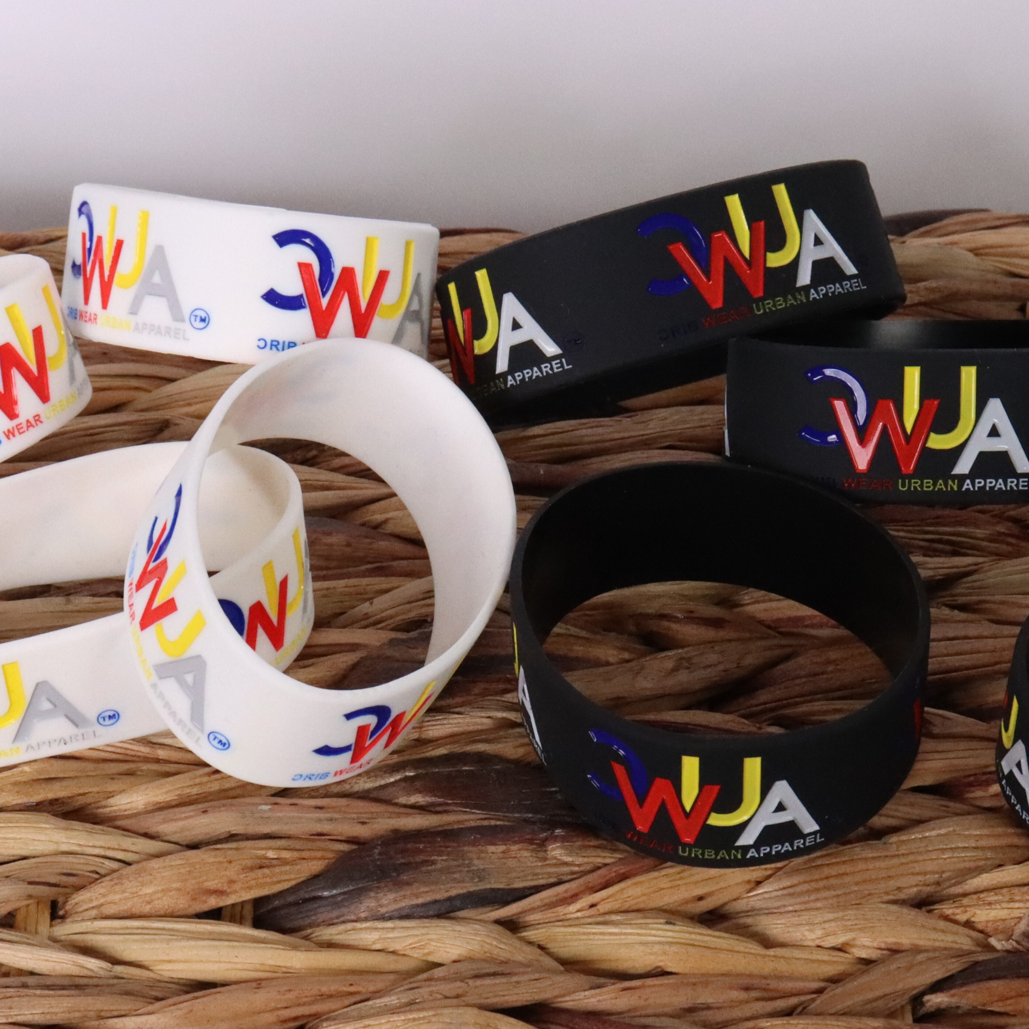 "CWUA"- SILICONE WRISTBAND SIGNATURE LOGO (WHITE / MULTI) DEBOSSED